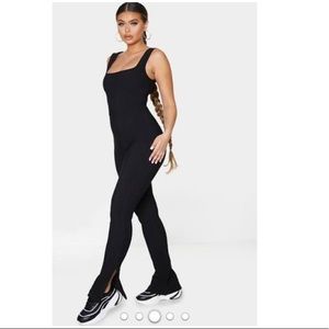 Black rubbed split hem jumpsuit